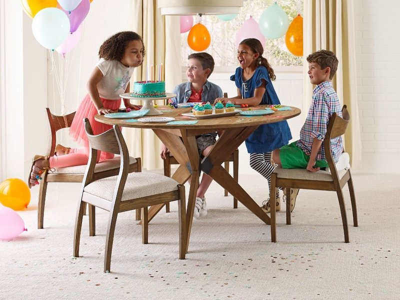 kids playing at table from McMillen's Carpet Outlet in Clarion